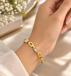 Gold Stainless Steel Handcuff with Emerald Green Stones | Luxury Bangle for Women